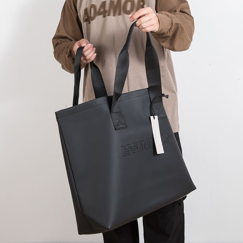 ESSENTIALS Large Capacity Tote Bag Travel Haversack Fashion Handbag for Men and Women